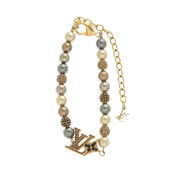 Louis Vuitton Dandy Metal Gold Bracelet in Gold from The Reluxe