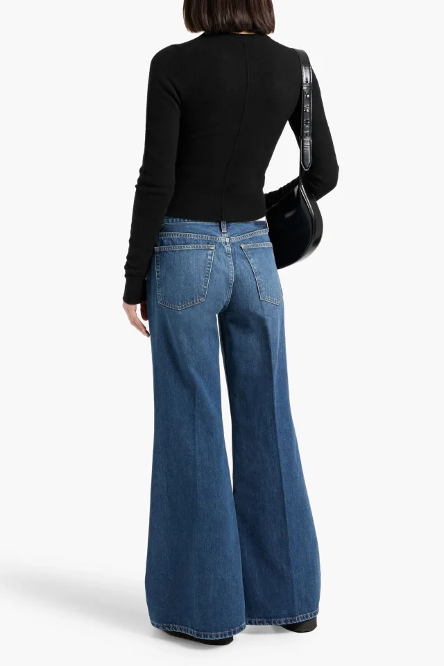 Re/Done Mid-Rise Flared Jeans in Mid denim, photo 3 of 4 from THE OUTNET