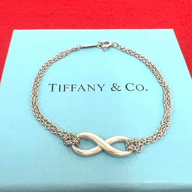 Tiffany & Co. Vintage Infinity Bracelet 925 Sterling Silver Chain Bangle in Silver from The Reluxe