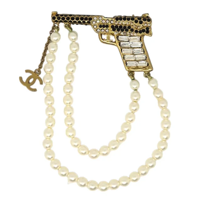 Chanel Gun Brooch Pin Rhinestone Artificial Pearl Gold 01A in Gold from AMORE Vintage Tokyo