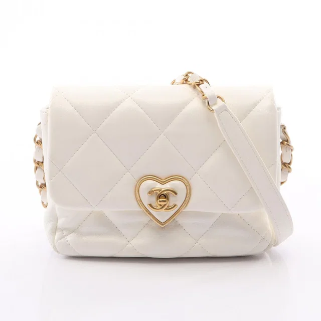 Chanel Shoulder Bag Quilted Heart Lock White Lambskin Small Chain in White Lambskin from The Reluxe