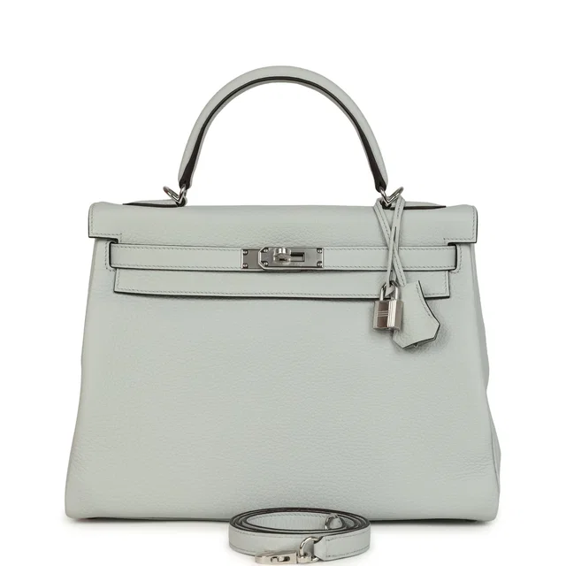 Hermès Kelly Retourne 32 Bleu Pale Clemence Palladium Hardware in Blue Clemence leather from Madison Avenue Couture