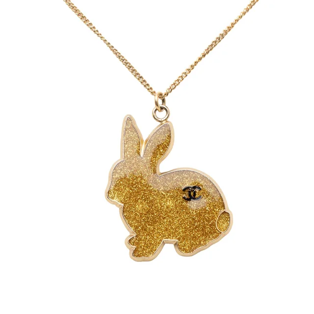 Gold Chanel CC Gold Plated Resin Rabbit Pendant Necklace in Gold Resin from Designer Revival