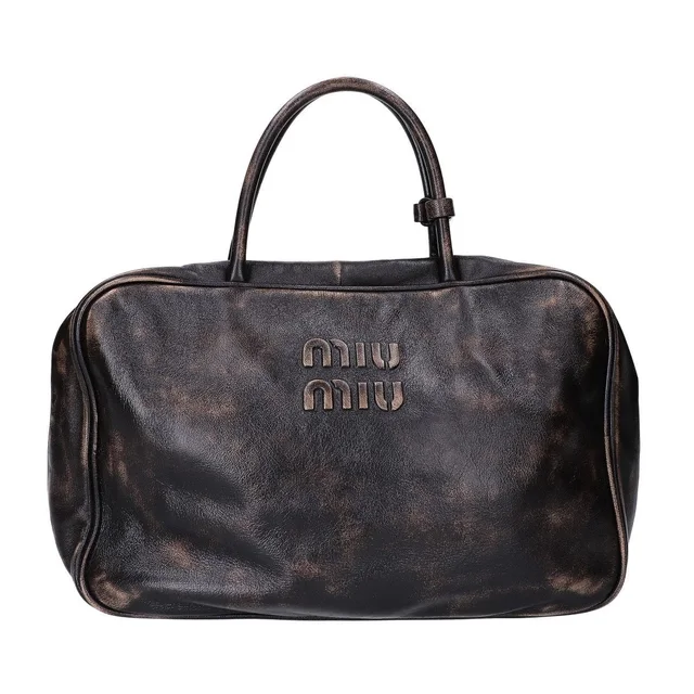 Miu Miu Vintage Wind Bow Nappa Leather in Nappa leather from The Reluxe