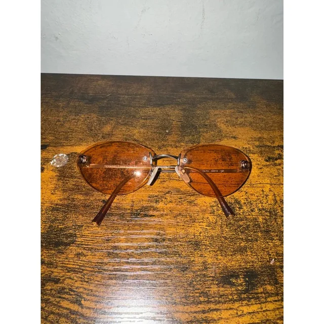 Chanel Vintage Y2K 4003 Rimless Oval Sunglasses Brown in brown|red from Grailed