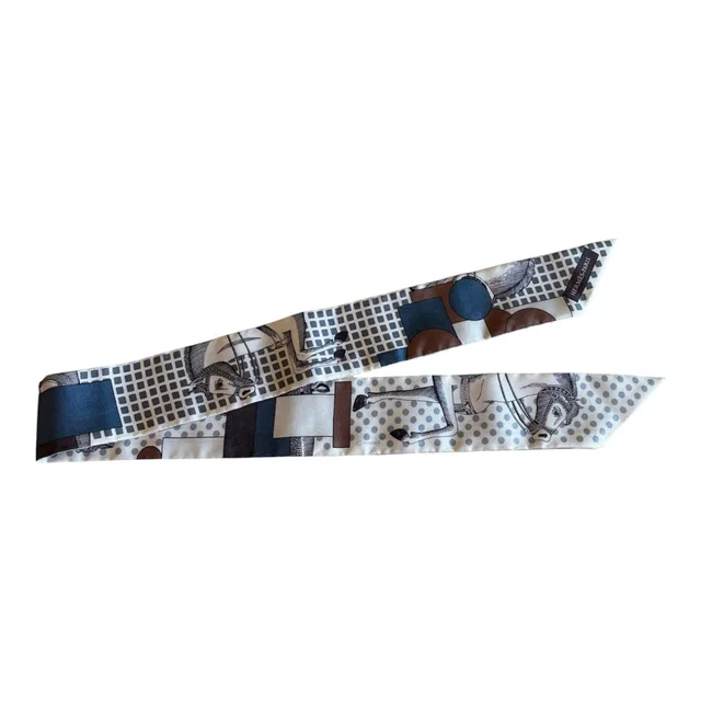 16. Hermes Silk Twilly in Silk from Luxury Promise