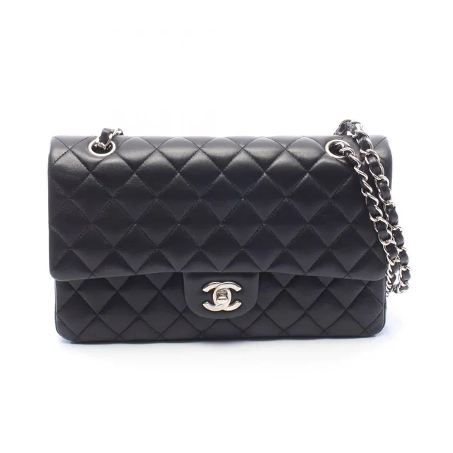 Chanel Shoulder Bag Quilted Double Flap Black Lambskin Chain in Black Lambskin from The Reluxe