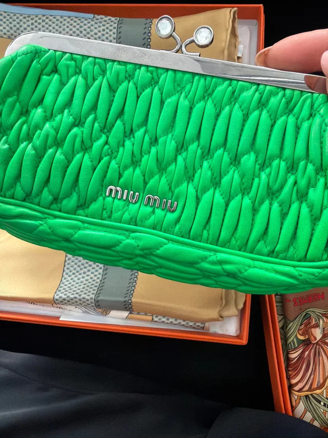 Miu Miu Matelassé leather frame/clasp bag green in Green Leather from Luxury Promise