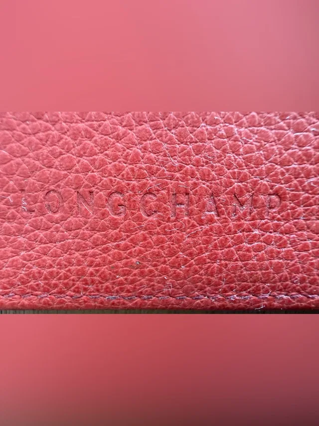 Longchamp Leather Continental Wallet in red Leather from Poshmark, photo 1 of 1