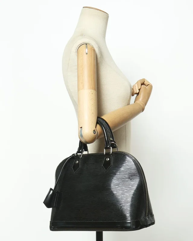 Louis Vuitton Electric Alma PM Bag in Leather from A Retro Tale, photo 11 of 11