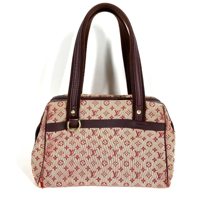 Louis Vuitton Handbag Josephine PM Monogram Canvas Cerise in Coated canvas from The Reluxe