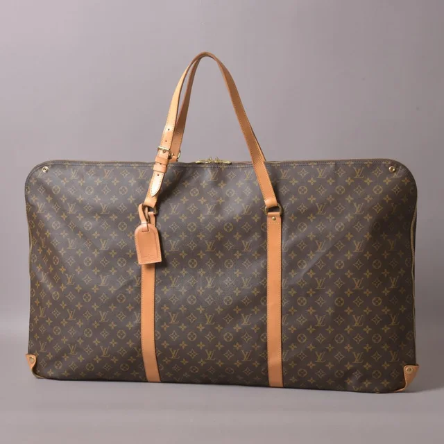 Louis Vuitton Cavour Garment Bag Suit Cover Monogram in Coated canvas from The Reluxe
