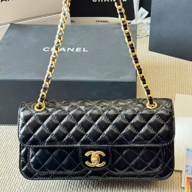 Classic Chanel Bag: A Stylish And Versatile Choice For Elegance in black from Poshmark