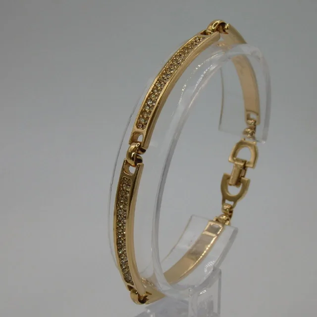 Dior Women's Bracelet - Gold in gold from Depop, photo 1 of 1
