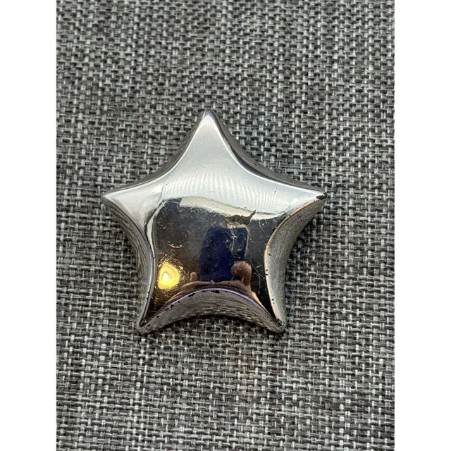 Givenchy Women's Brooch - Silver in gray|silver from Depop, photo 1 of 1