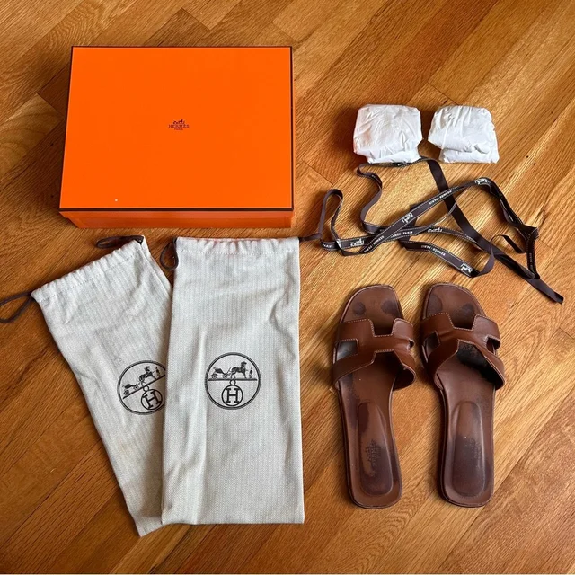 Hermès Gold Oran Sandals 42 in brown|red from Poshmark