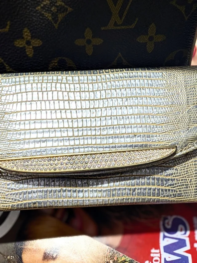 Judith Leiber Embossed Crystal Bar Clutch in gold Lizard from Poshmark, photo 1 of 1