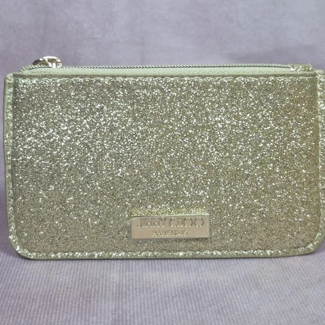 Jimmy Choo Women's Bag - Gold/Silver in gold|gray|silver from Depop, photo 1 of 1