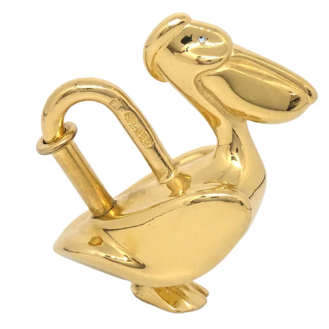 Hermès Pelican Motif 1992 Limited Cadena Padlock Gold Bag Charm in Gold from AMORE Vintage Tokyo