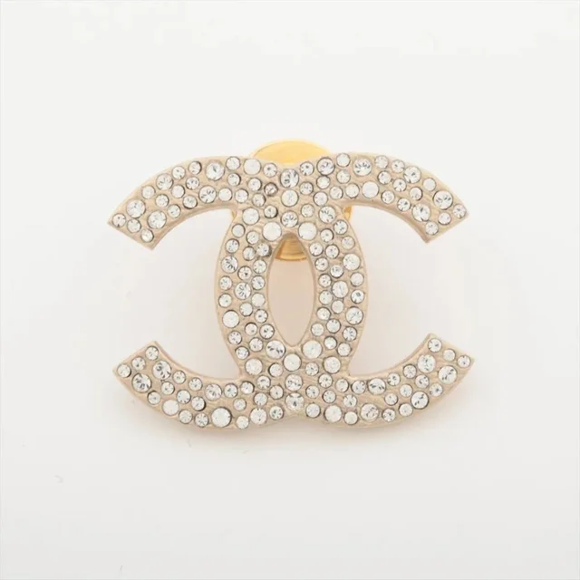 Chanel Gold rhinestone brooch in Gold from Sign of the Times
