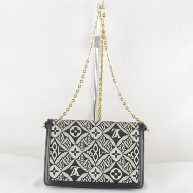 Louis Vuitton Jacquard Portefeuille Dauphine canvas leather shoulder bag in Black Canvas from LuxUness, photo 2 of 8