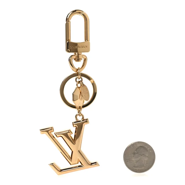 LV Facettes Bag Charm Key Holder Gold in Gold from FASHIONPHILE, photo 2 of 3