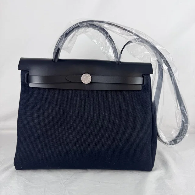 Hermès Herbag Zip 31 Black Bag in Black Leather, Metal, military canvas from Reowned