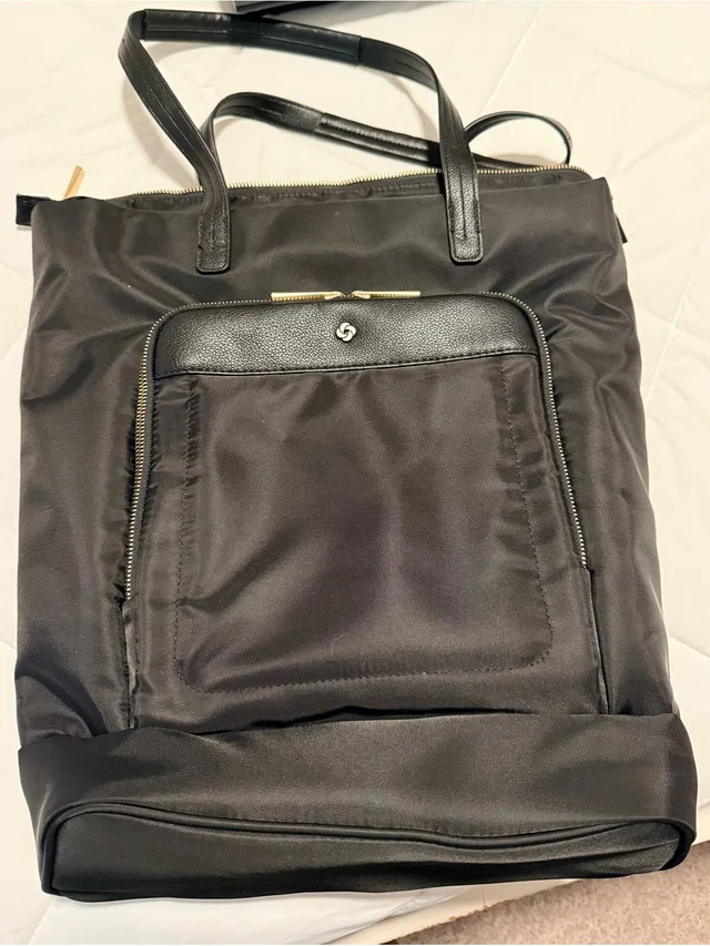 Samsonite Laptop Backpack in black from Poshmark