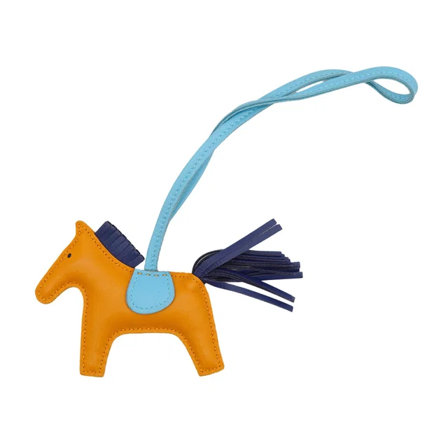 Hermès Bag Charm Rodeo PM Naturel Sable Bleu Saphir Celeste Agneau Milo 2017 A Stamp in Beige Leather from Luxury Promise