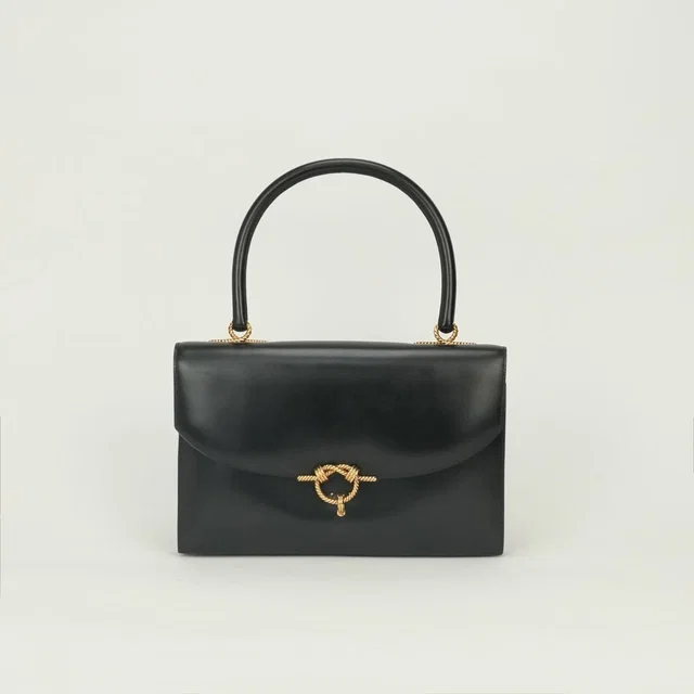 Hermès Tote Box Calf Noir Black Gold Handbag in Black Box leather from The Reluxe