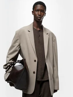 The Row Short jacket with center button closure in 100% Wool, photo 4 of 9 from LUISAVIAROMA