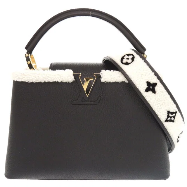 Louis Vuitton Capucines MM IC Taurillon Leather Shearling Black Handbag in Black Leather from The Reluxe