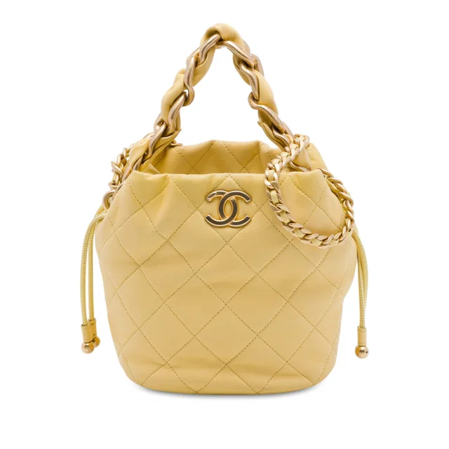 Yellow Chanel CC Quilted Lambskin Drawstring Bucket Bag Satchel in Yellow Lambskin from Designer Revival