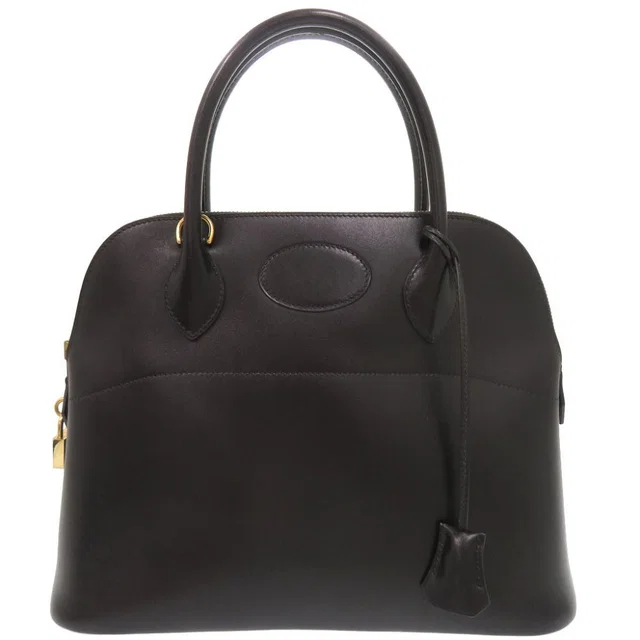 Hermès Bolide 31 Box Calf Black Gold Handbag in Black Box leather from The Reluxe