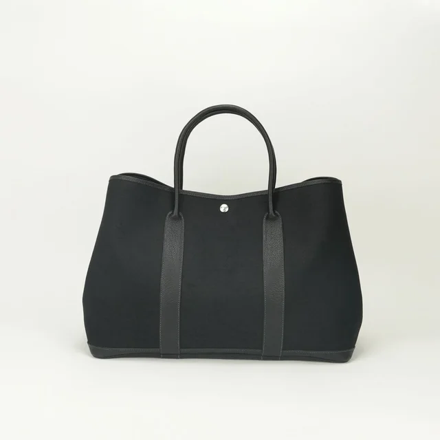 Hermès Garden Party GM 50 Tote Toile Officier Noir Black Silver Handbag in Black Canvas from The Reluxe