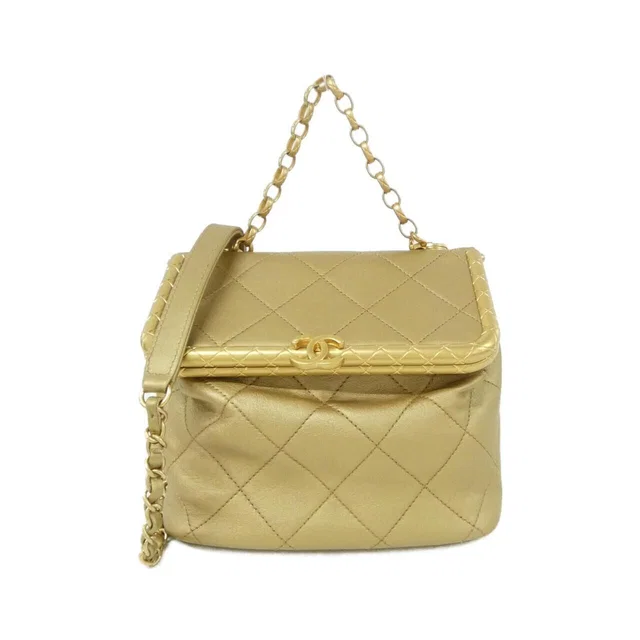 Chanel Bag Handbag Gold in Gold Togo leather from The Reluxe