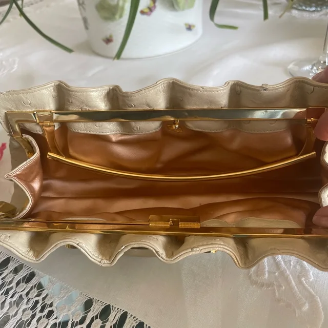 Judith Leiber Clutch With Crystal Accents 11”L 4” H 2” W in gold Ostrich from Poshmark, photo 4 of 6