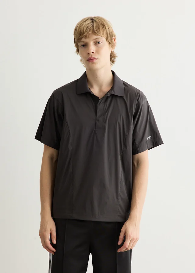 New Balance NB Grey Polo in Black from Incu, photo 1 of 1