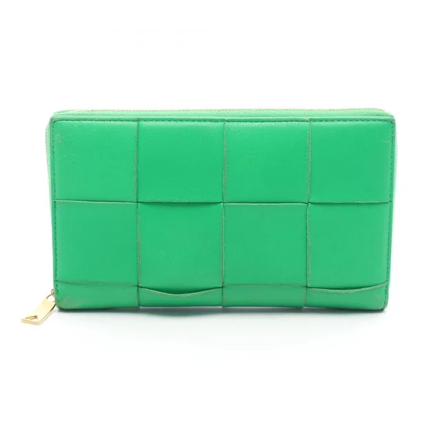 Bottega Veneta Round Wallet Cassette Zip Around Maxi Intrecciato Green Leather in Green Woven leather from The Reluxe