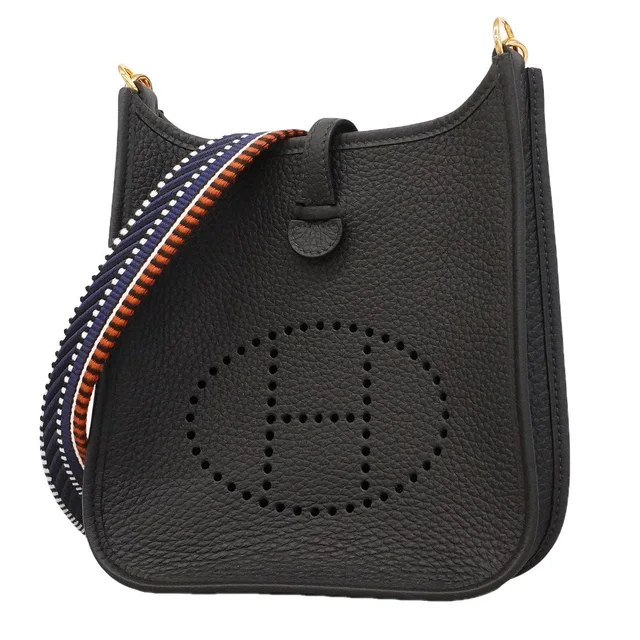 Hermès Shoulder Bag Evelyne TPM Taurillon Clemence Bleu Nuit Gold in Navy Clemence leather from The Reluxe