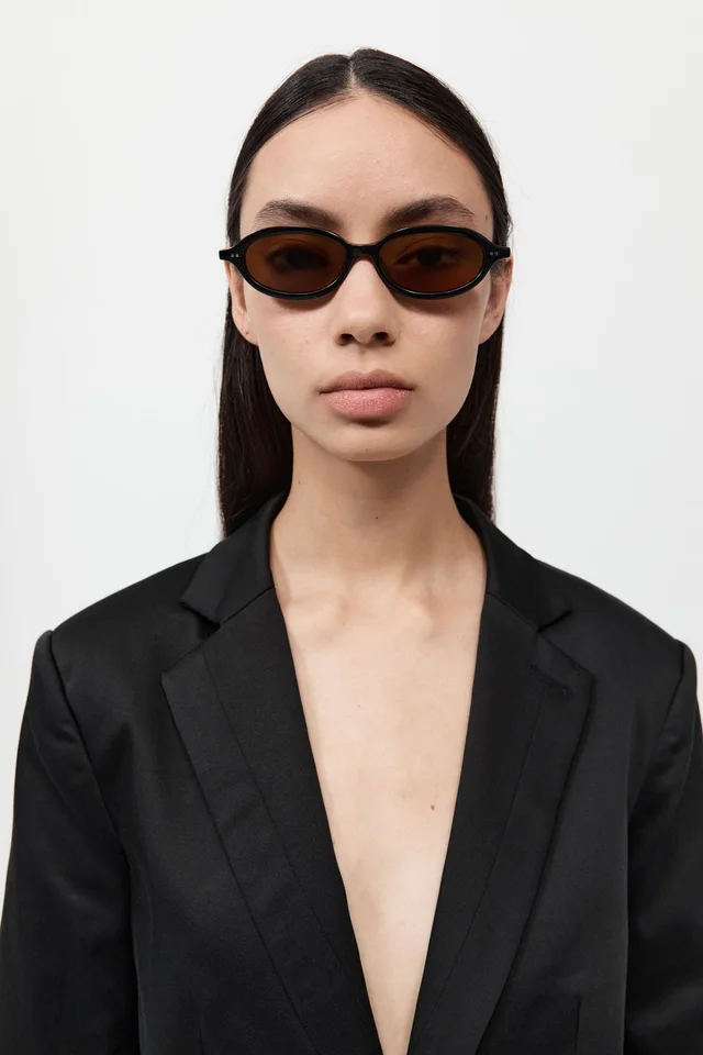 St Agni 90s Slim Oval Sunglasses - Black/Brown from St. Agni, photo 1 of 1