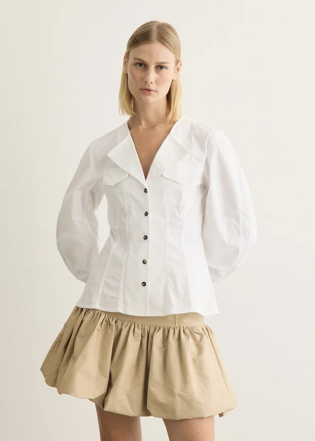 Ganni V-Neck Long Sleeve Shirt in White from Incu, photo 1 of 1