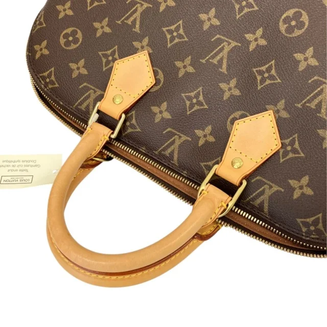 Louis Vuitton Alma PM Monogram Handbag in Brown Canvas from LuxUness, photo 5 of 13