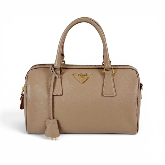 Prada Trial Patch Top Handle Satchel Saffiano Leather Beige Pink Mini in Beige Saffiano leather from The Reluxe