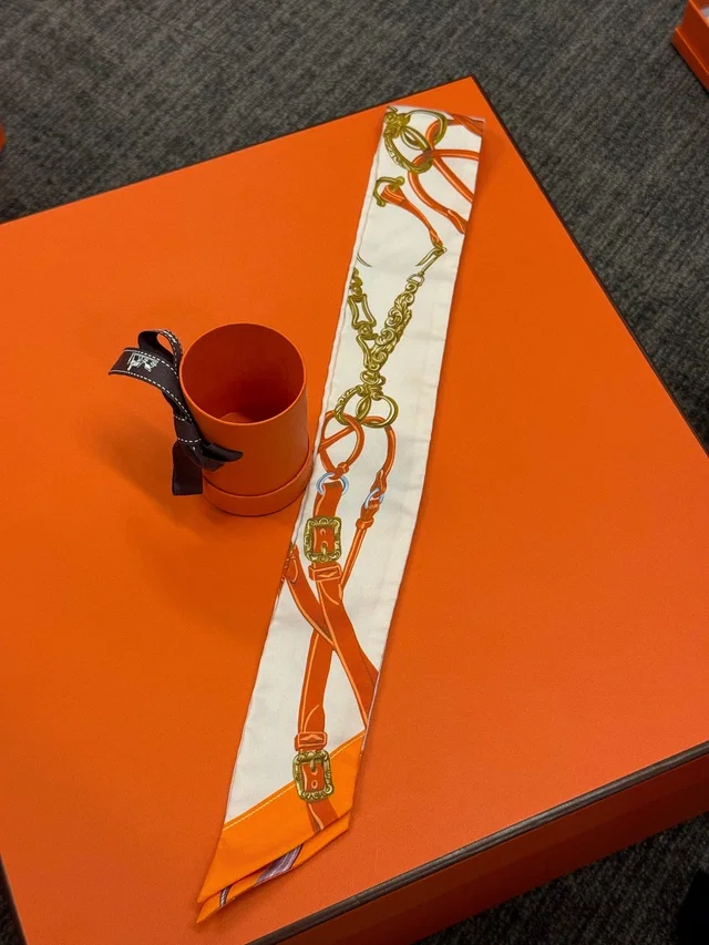 Hermès Twilly - White & Orange Equestrian Print in White Silk from Luxury Promise
