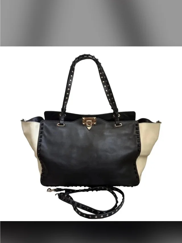 469. Valentino Garavani Rockstud Trapeze Tote Bag W/Coa in black Leather from Poshmark