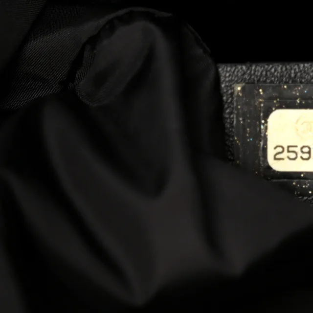Chanel Printed Airline Drawstring Bag Black Blue in Black Canvas from FASHIONPHILE, photo 7 of 12