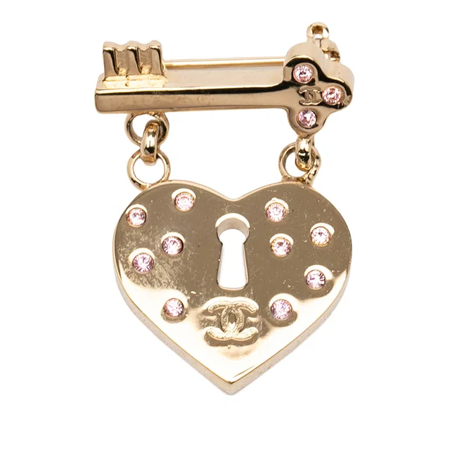 Gold Chanel CC Gold Plated Strass Heart Lock and Key Brooch in Gold from Designer Revival