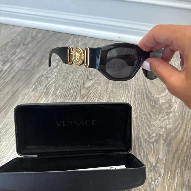 Versace Women's Sunglasses - Black in black from Depop, photo 1 of 1