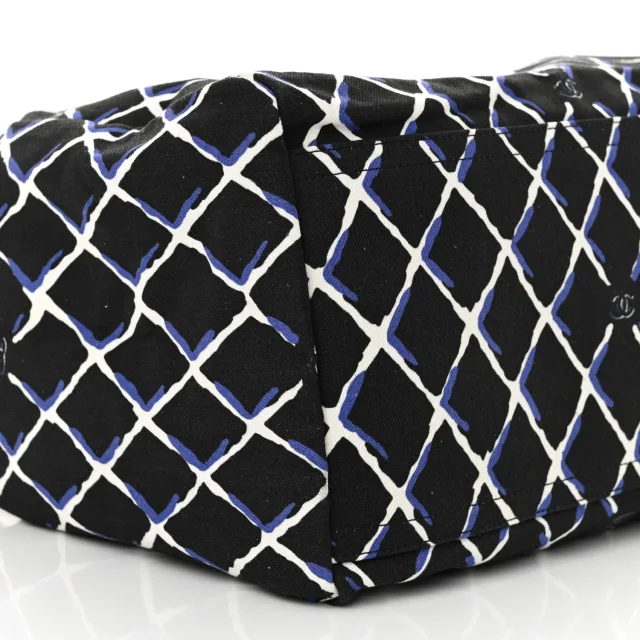 Chanel Printed Airline Drawstring Bag Black Blue in Black Canvas from FASHIONPHILE, photo 9 of 12